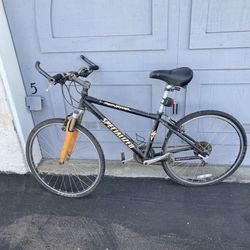 Specialized Rockhopper mountain bike with 2 Schwinn Quick Wrap LED Schwinn Bike Lights