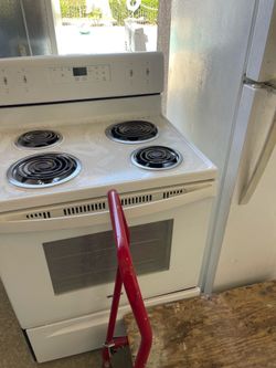 Semi new electrical stove, whirlpool
