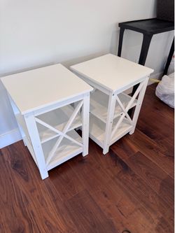 Two white side tables