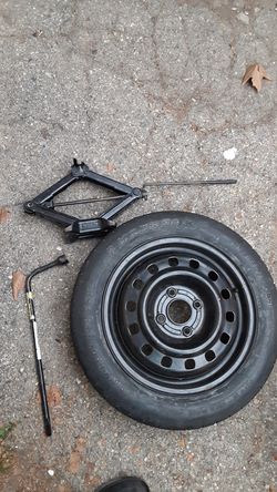 Spare tire,Jack and bar