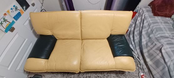 Italian leather love seat