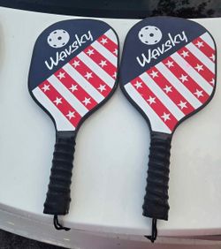 Pickle ball Raquets /paddles. 2 balls are included.
Used. Great condition.