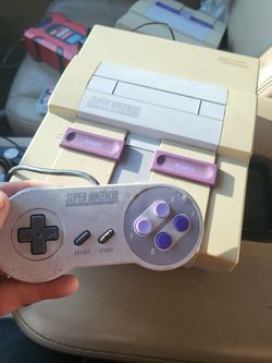 Super Nintendo System With controller and cords working perfectly.