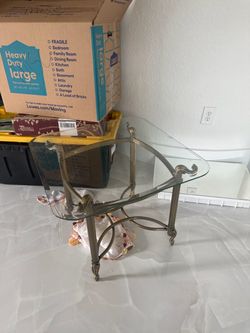3 matching glass-top tables
