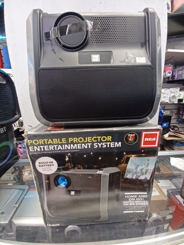 Quality Projector By Rca Rechargeable. Brand New