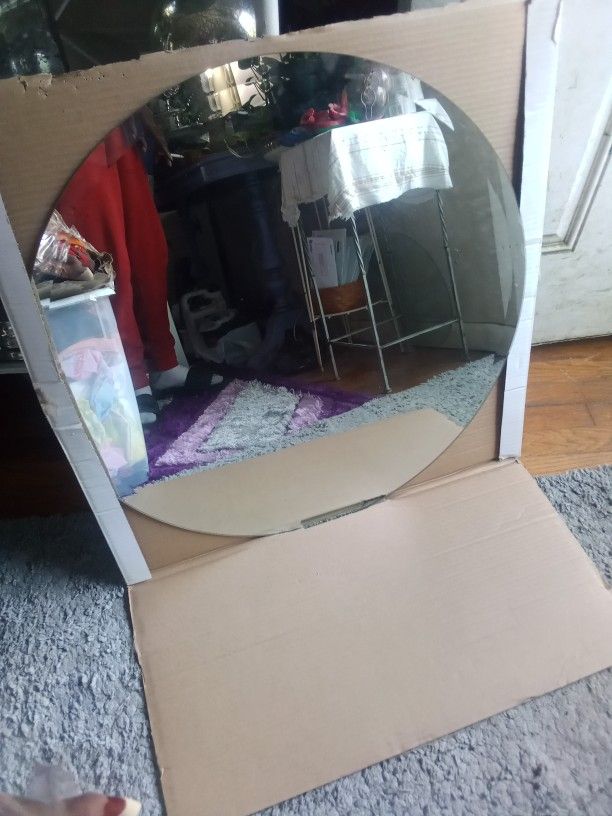 Frameless Round Mirror,It's 28 In Round,$20