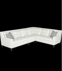 Rooms to go sectional couch with ottoman