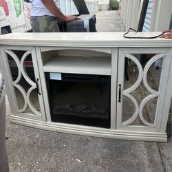 Tv stand with built in fireplace