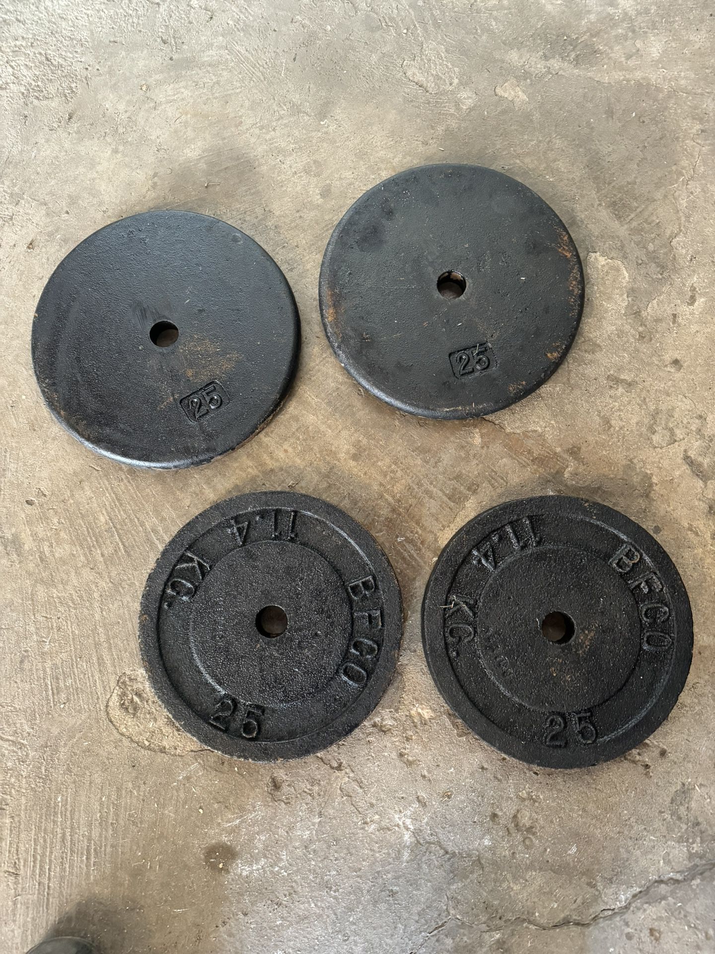 4 25 Lbs Weight Plates 