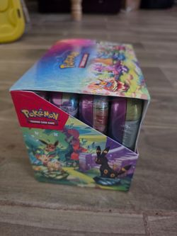 Pokemon Prismatic Evolutions Tin Box Set 16 Packs sealed