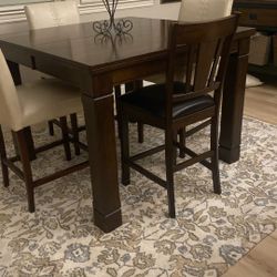 Leaf Dining Table Comes With 6 Brown Chairs  