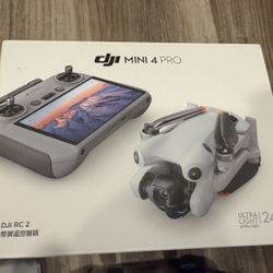 DJI Mini 4 Pro Camera Drone Bundle with RC2 Controller extra battery and extras.  