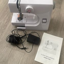 Sewing Machine And Supplies