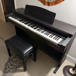 ROLAND PIANO WITH CHAIR