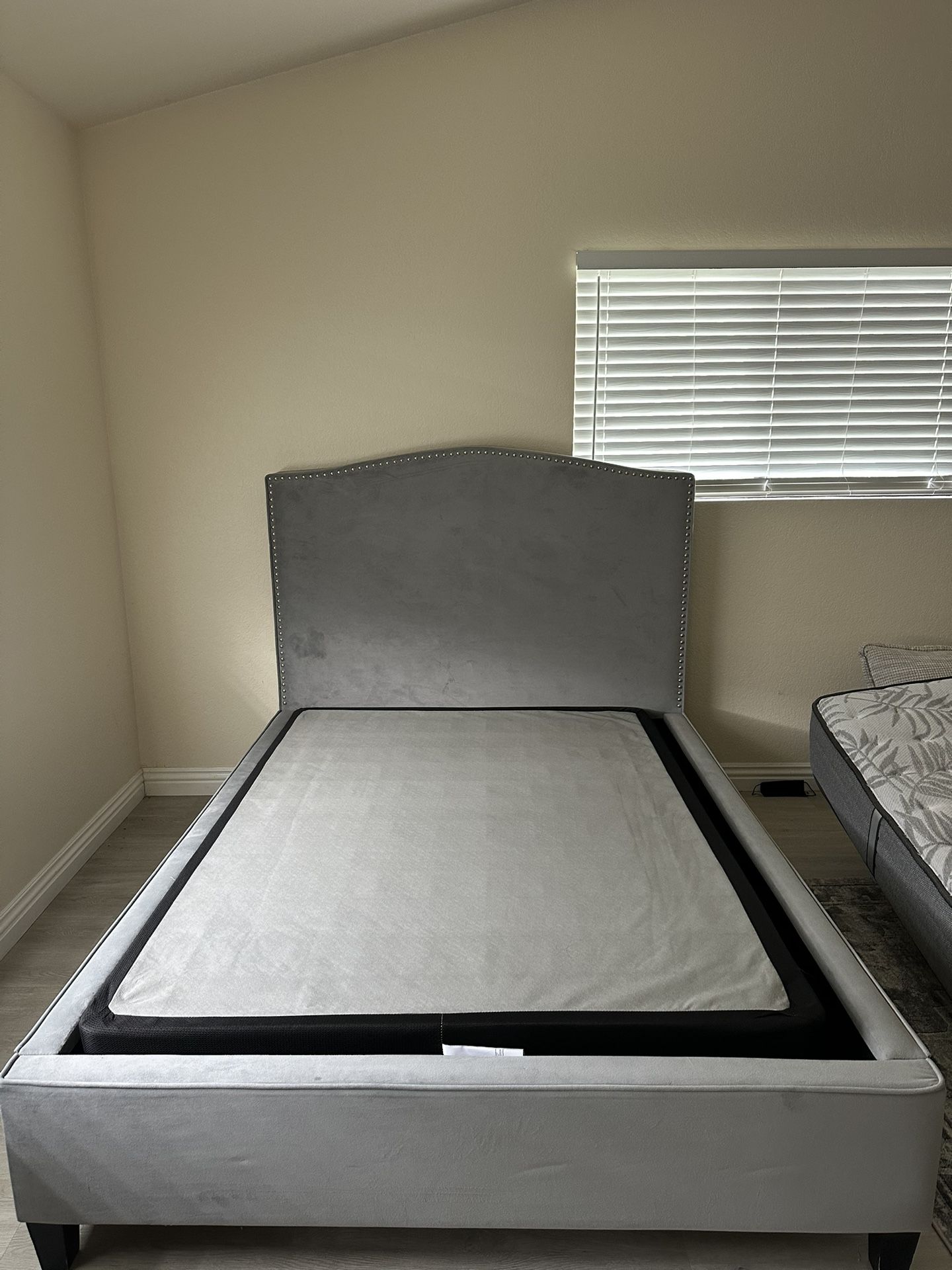 Full size bed frame with mattress and box spring