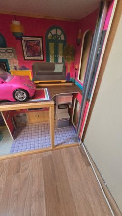 Barbie car and doll house
