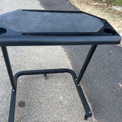 A Food Tray On Wheels Come up And Go Down 