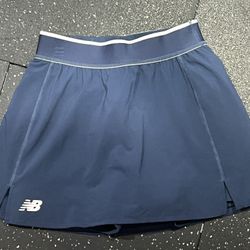 Women’s New Balance running tennis skirt ( skort) Navy Blue Small 