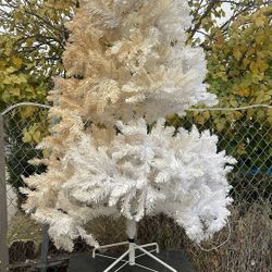 Xmas Tree About 7 Feet Great Condition With Stand . Stained On One Side . You Can Spray Paint It Carefully And Lights Works Great 