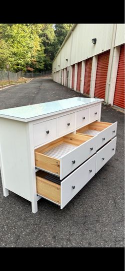 Solid wood white long dresser with big drawers. Drawer sliding smoothly. Delivery available