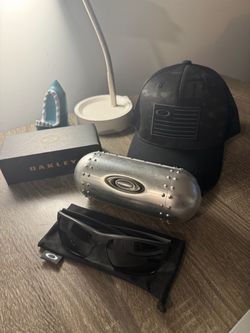 Oakley Sunglasses and Oakley Baseball Cap.