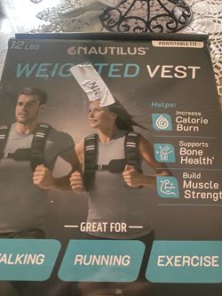 New in box 12 pound weighted vest great for walking running and exercise