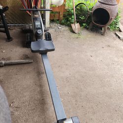 Row Machine And Weight Set