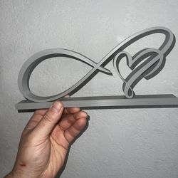 Statuette of love and infinity made of plastic!