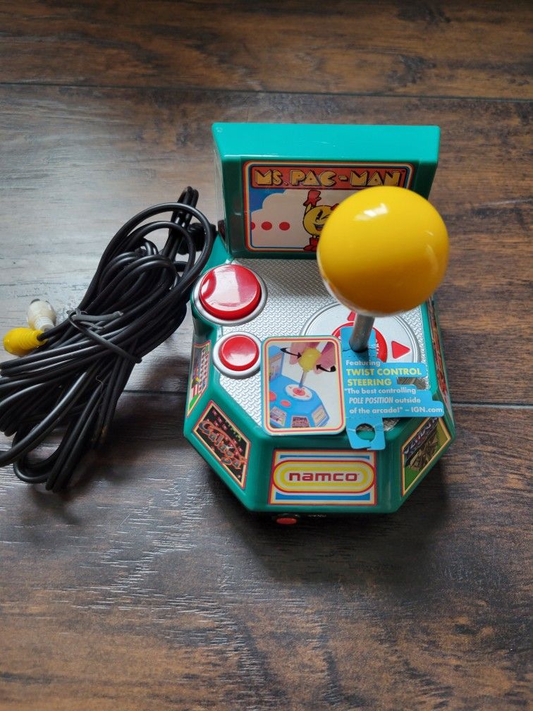 NAMCO MS. PAC- MAN CONNECT AND PLAY GAMEBRAND NEW IN ORIGINAL PACKAGING FROM QVC BOX IS IN NO SO GOOD SHAPE $50.00