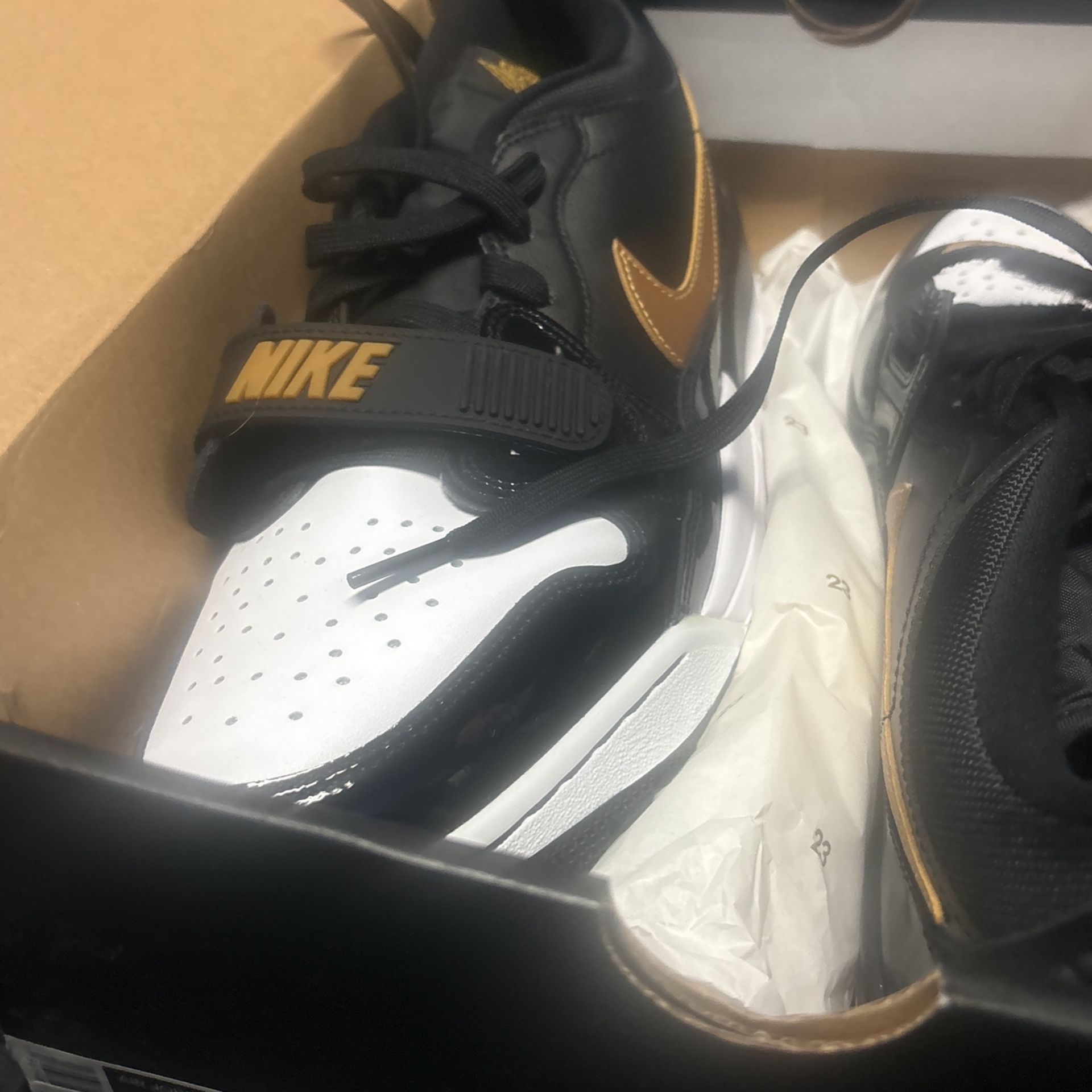 air Jordans color gold and black size 12