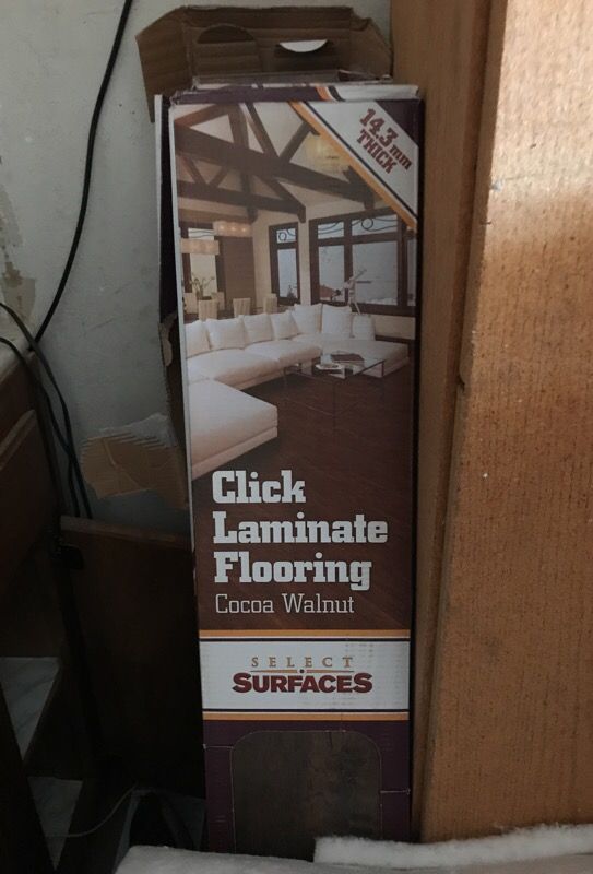 6 boxes of select surfaces cocoa walnut laminate flooring, moving need it gone!