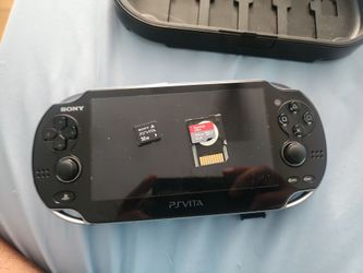 Ps Vita with official 32gb card + micro sd