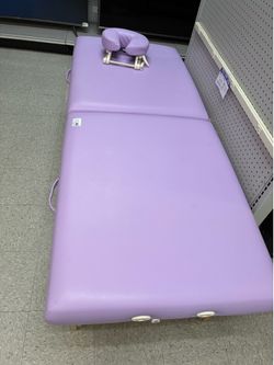 Massage table