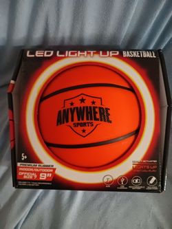 New Light up basketball, new with hand pump