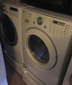 Lg frontload washer and dryer set on pedestals/ warranty/ delivery and installation are available