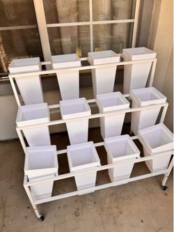 Selling Bloom Flower Cart. 12 white bucket containers included. Assembled and used