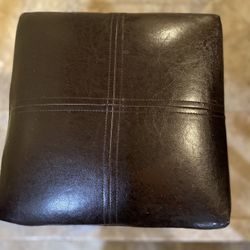 Faux Leather T-stitch chocolate brown Ottoman/Footstool. 13”x13” width, 10.5” height. 