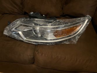 2011 Ford Taurus Headlight