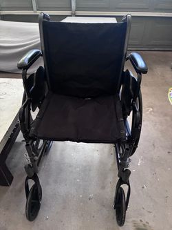 Black Transport Wheelchair with Padded Seat