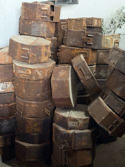 Vintage film reel canisters and theater seats
