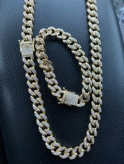 New 18 k yellow gold Cuban link chain and bracelet