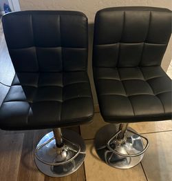 (2) LEATHER FAUX BLACK STOOLS