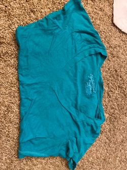 Woman’s american eagle shirt size large