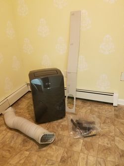 LG Electronics 12,000 BTU (7,500 BTU, DOE) 115-Volt Portable Air Conditioner with Dehumidifier Function and LCD Remote in Gray