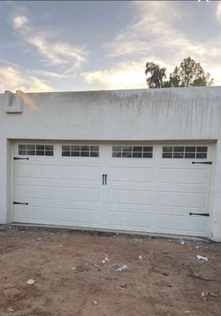 Used(Like New) Steel Back Insulated Garage Door 16x7