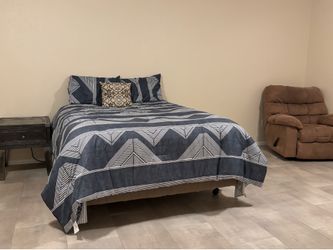 Bed, recliner, side table with cable cord