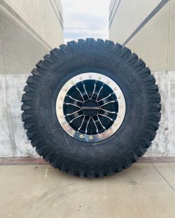 On sale. New: Raceline 15x7 4x137 Beadlock wheels & 33x10-15 tires for Can am Maverick X3 & Honda talon SXS UTV ( We Finance)