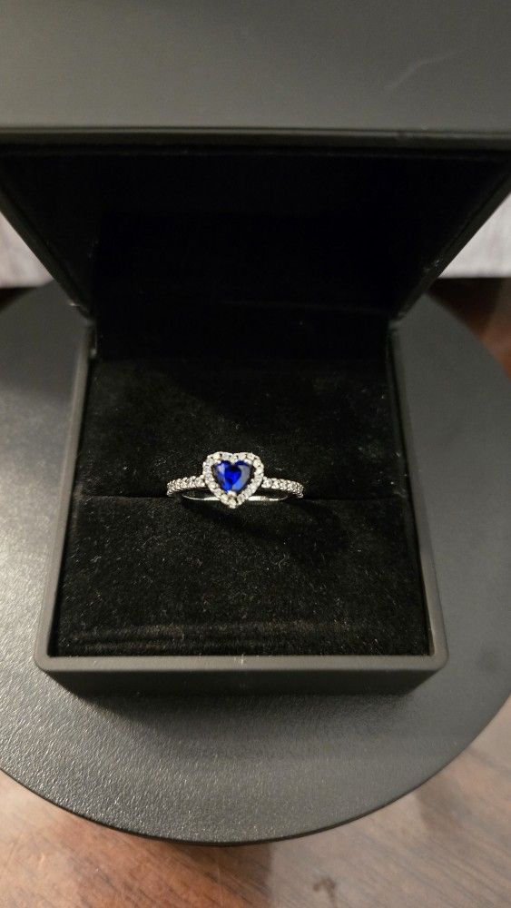 New Size 6 Sapphire blue sterling silver 925 heart shaped ring. Comes in its Light-up ring box.
