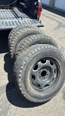 Four 225-75—17.  Wheels Rims Only 