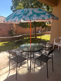 Outdoor Patio Table + 4 black stackable chairs , Umbrella and matching end table all for $100 OBO